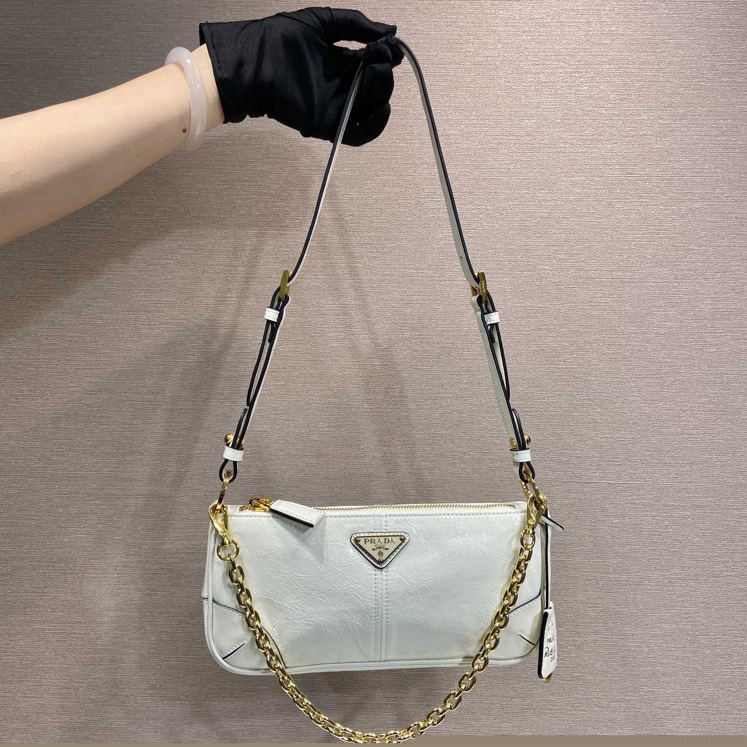 Pra*a top handle bags
